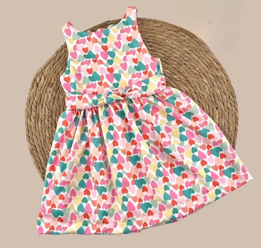 VESTIDO CORAZONES DETALLE LAZOS EN ESPALDA